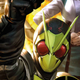 The black-and-green-masked Kamen Rider holds his fist aloft with an explosion behind him.
